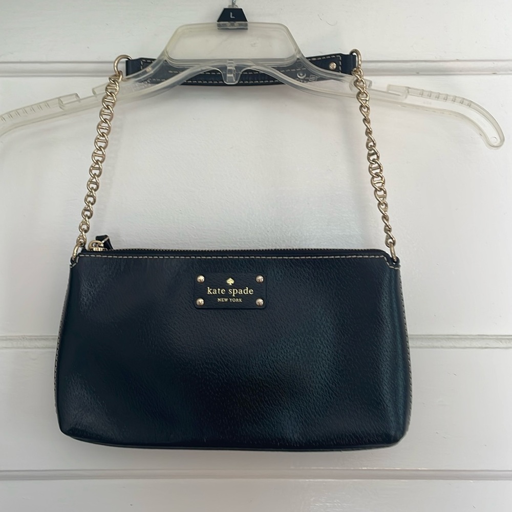 Kate Spade black mini purse with gold hardware.